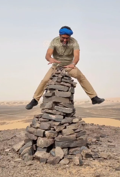 Yahya Bouziti, founder of Let's Explore Morocco, in the desert